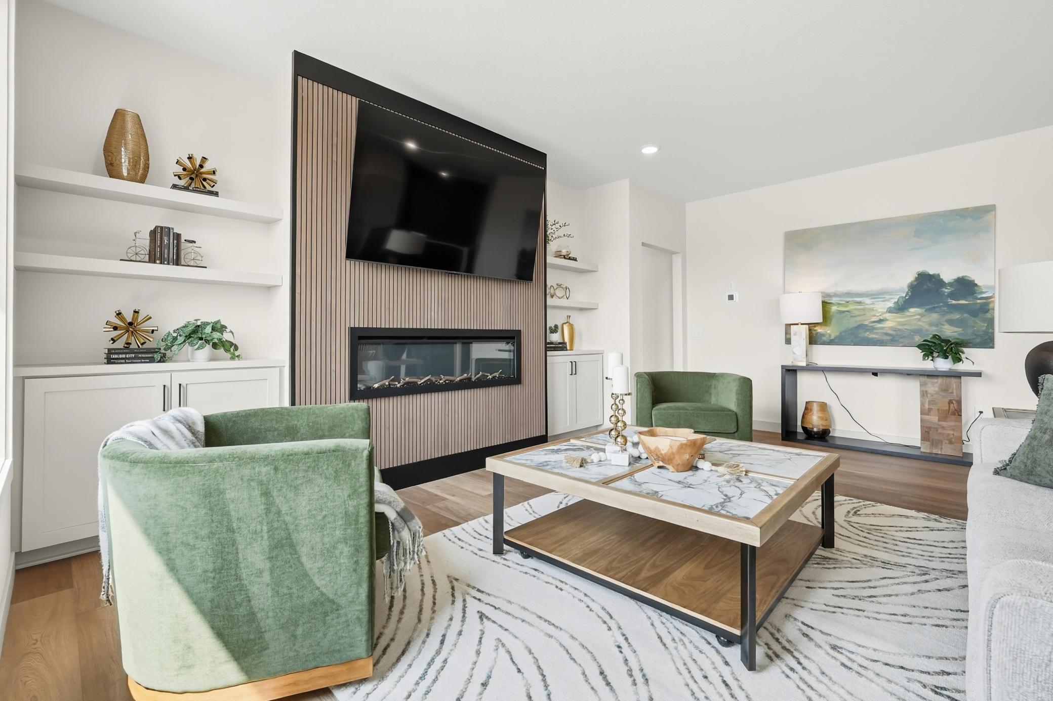 Impressive living room focal point boasting a vertical wood-slat accent wall, linear electric fireplace, built-in lower storage cabinets, and flanking floating shelves for custom display.