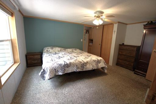 PRIMARY BEDROOM WITH WALK-IN CLOSET & BATH