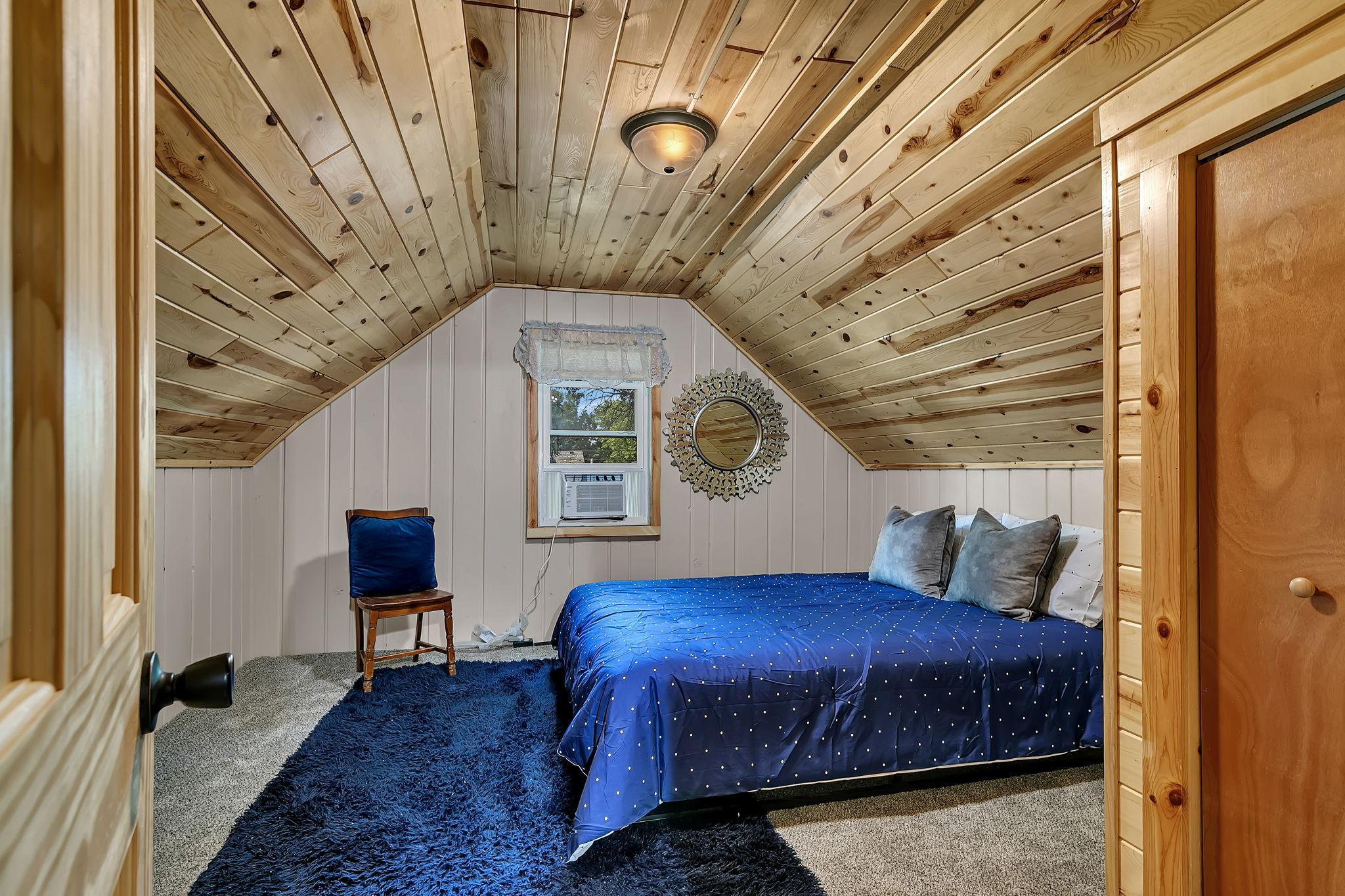 The upper level features the main bedroom with beautiful pine woodwork, private 3/4 bath and multiple closets!