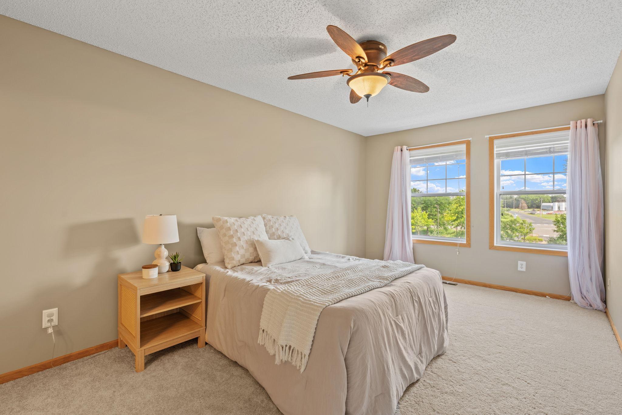 Primary suite with walk in closet and private bath
