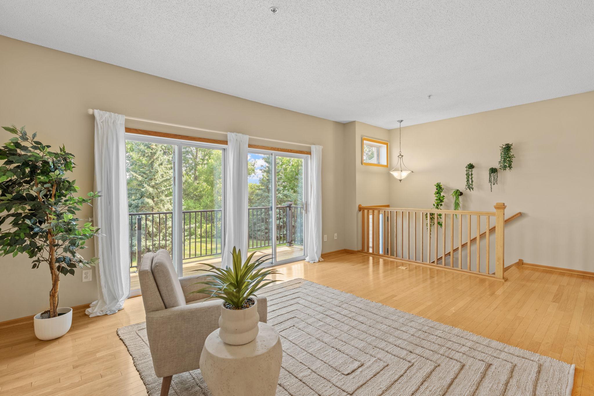 Living room with a walkout on deck