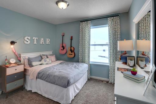 With two secondary bedrooms upstairs and one in the basement, the Rushmore has a room for everyone! *Picture is a model home; actual finishes may vary.