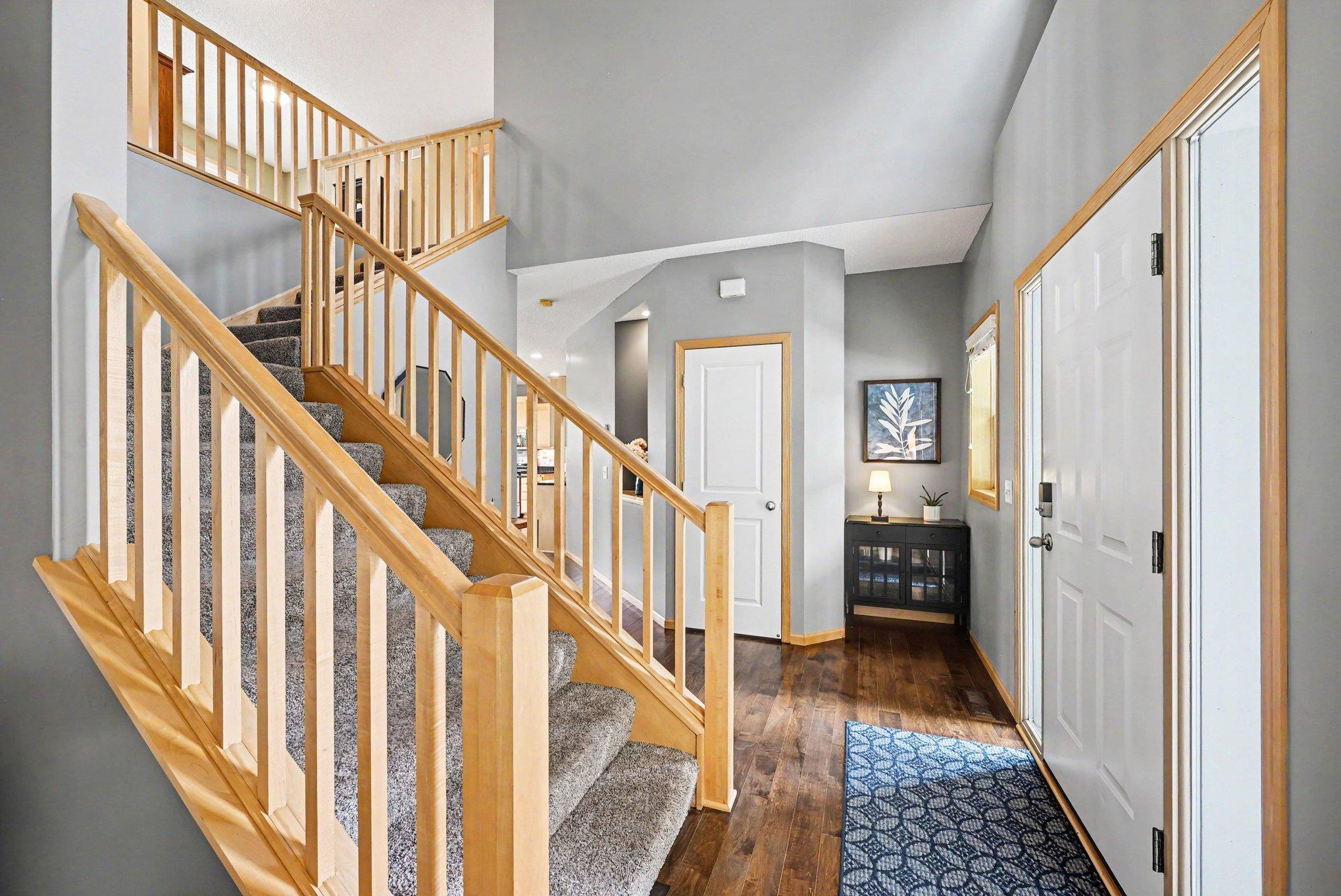 Two-story entryway leading into the main level