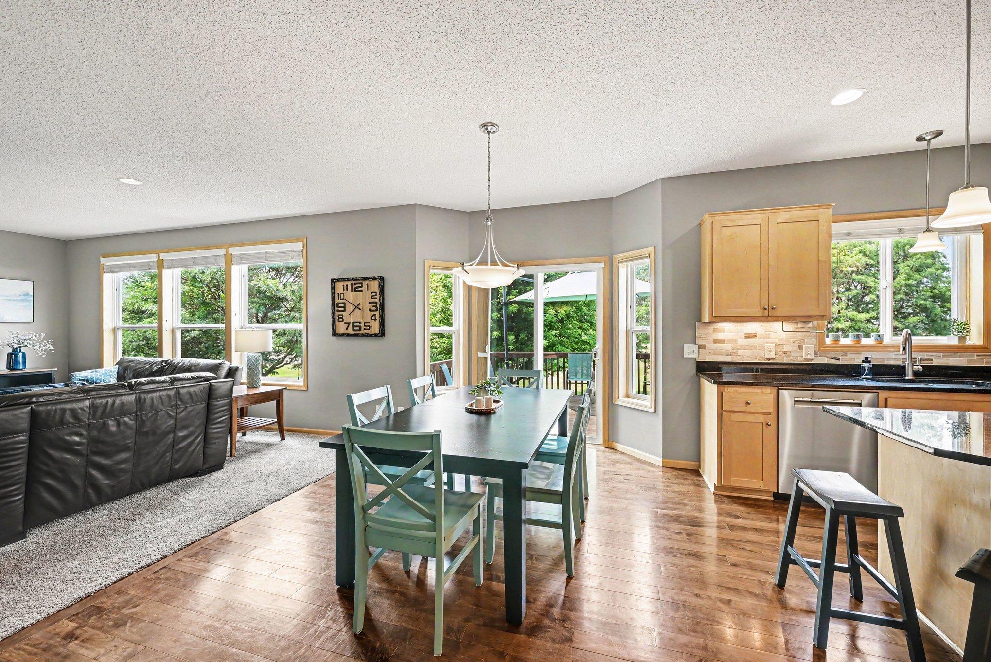 Dining space with deck access to Riverside Fields Park
