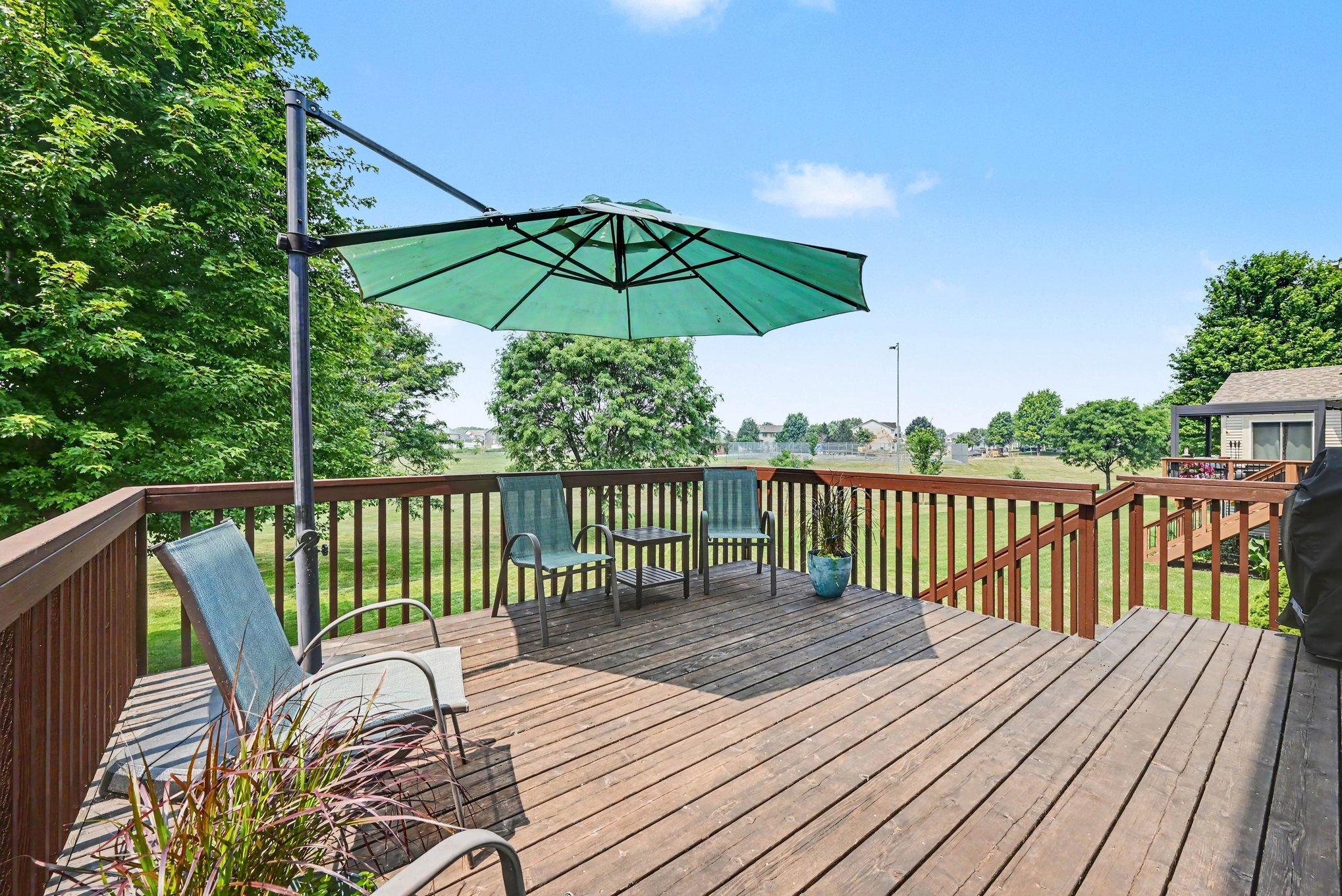 Deck seating area with park views