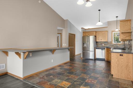 Large breakfast bar and space for a table & chairs