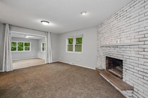 View of dining room looking into sunroom. Lots of natural light!