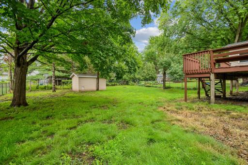 Backyard with view of shed.