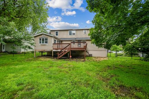 Backyard - Great view of the sunroom and the deck!