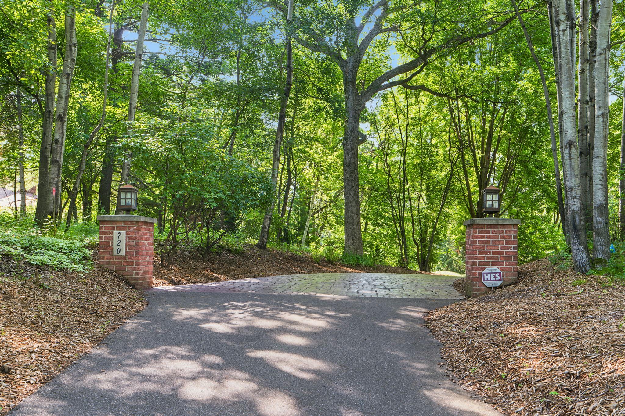 Brick pillars mark the private entrance at the end of Timber Lane.