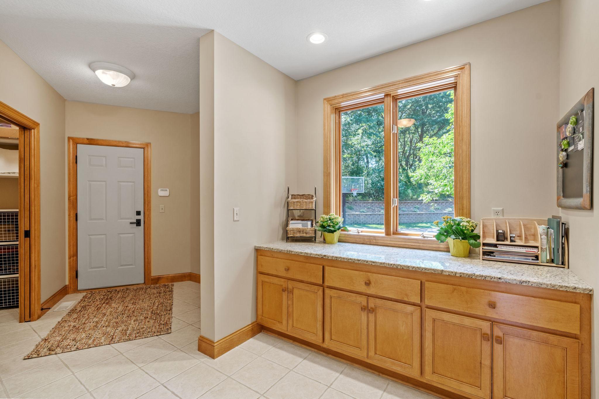 Main floor mudroom with walk in closet.