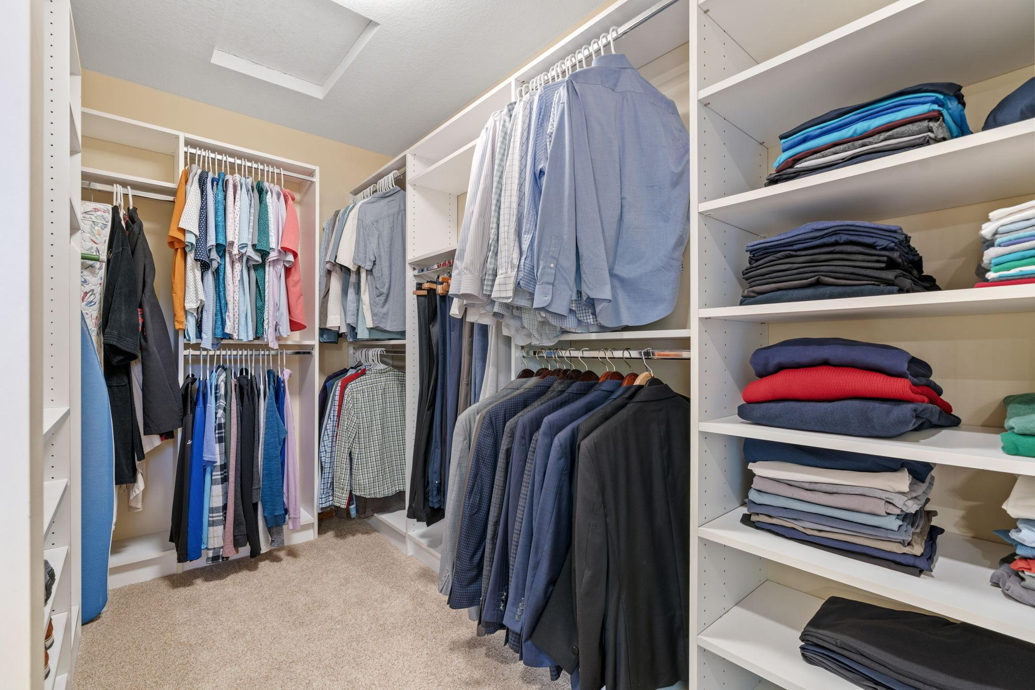 Half of the primary closet.