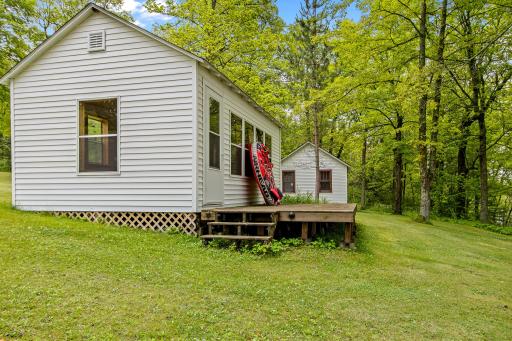 A view of the 2 seasonal bunk houses. lakeside.