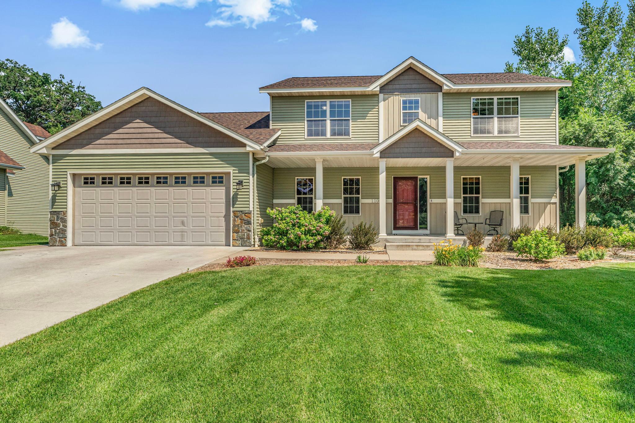 The in-ground sprinkler keeps the lawn lush and green while helping the landscaping and flowers thrive all season long.