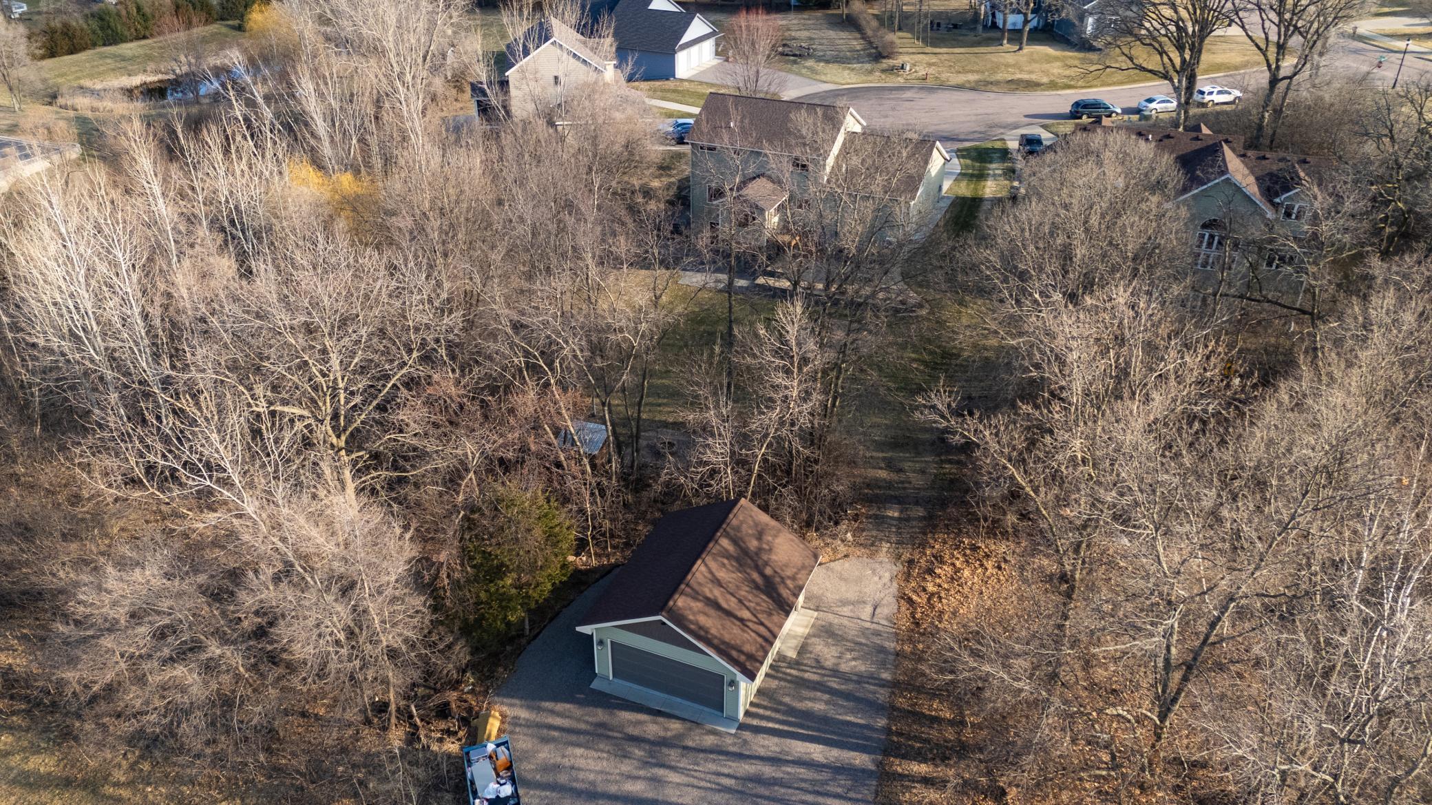 large wooden lot with 24x24 detached garage