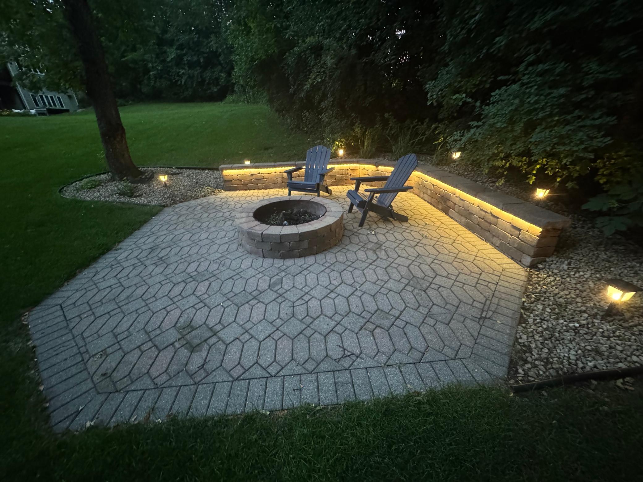 Enjoy cozy evenings by your backyard fire ring.