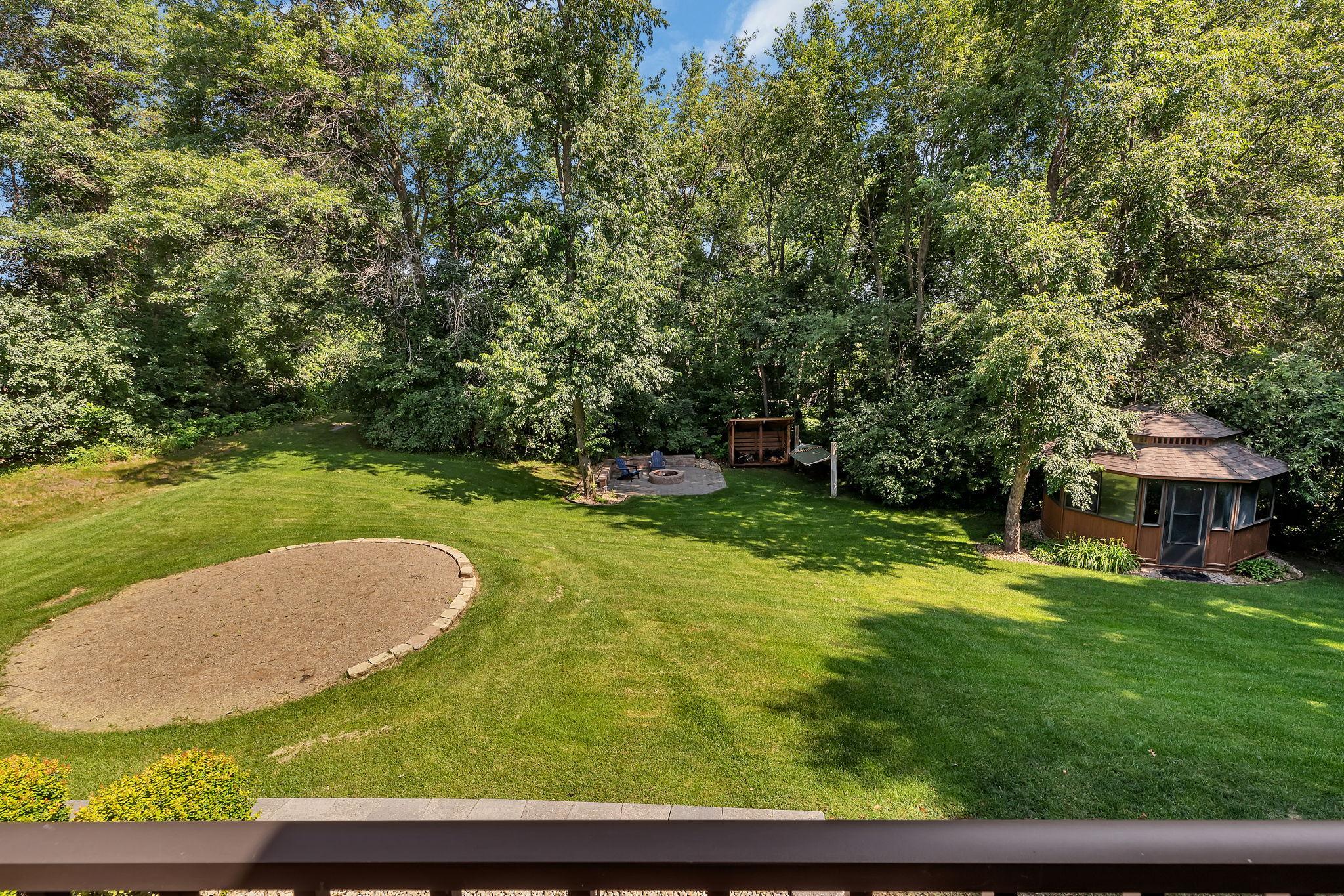 Another view of the backyard with pool pad