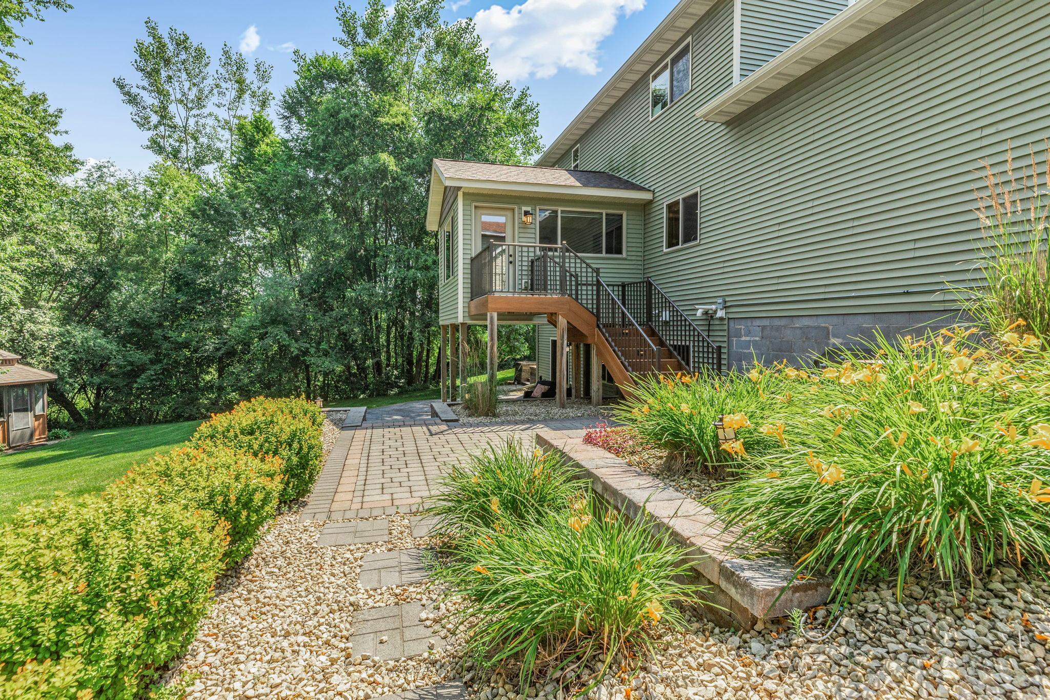 Private backyard with large mature trees surrounding the property