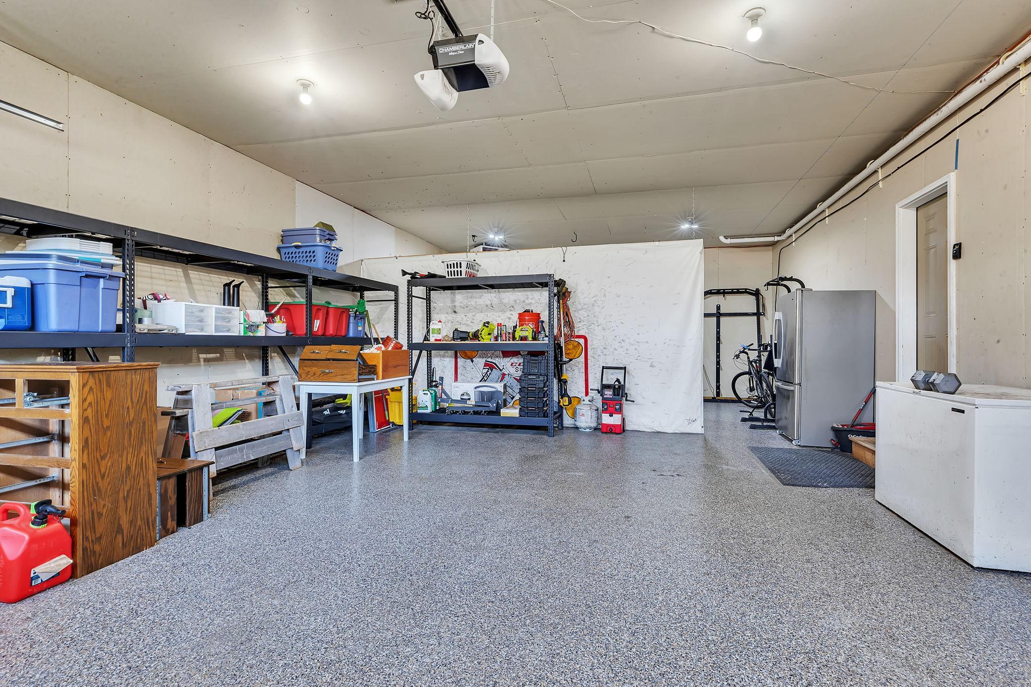 Extra large, heated and finished 4 stall garage
