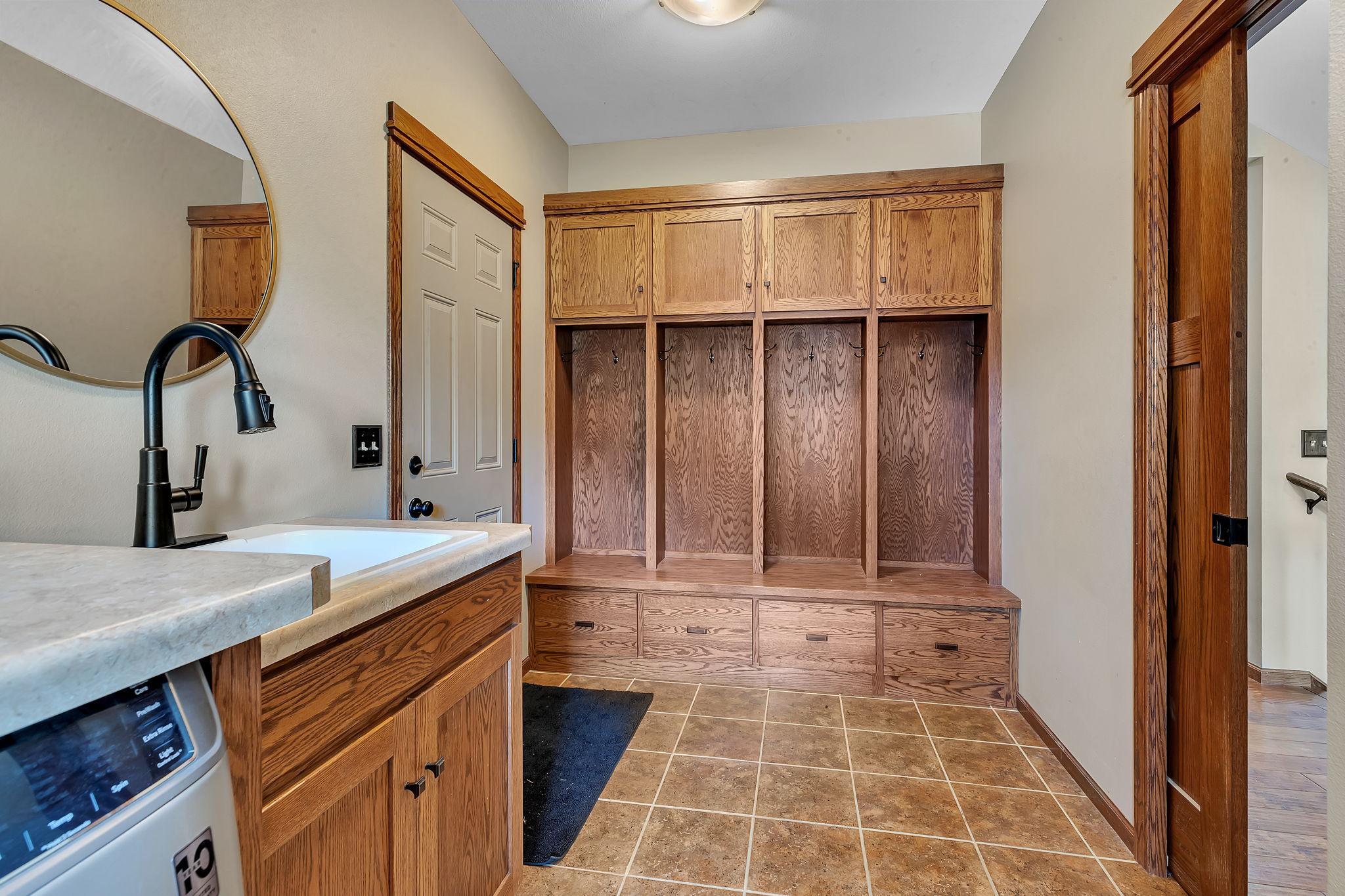 Well-designed and accessible large lockers off garage