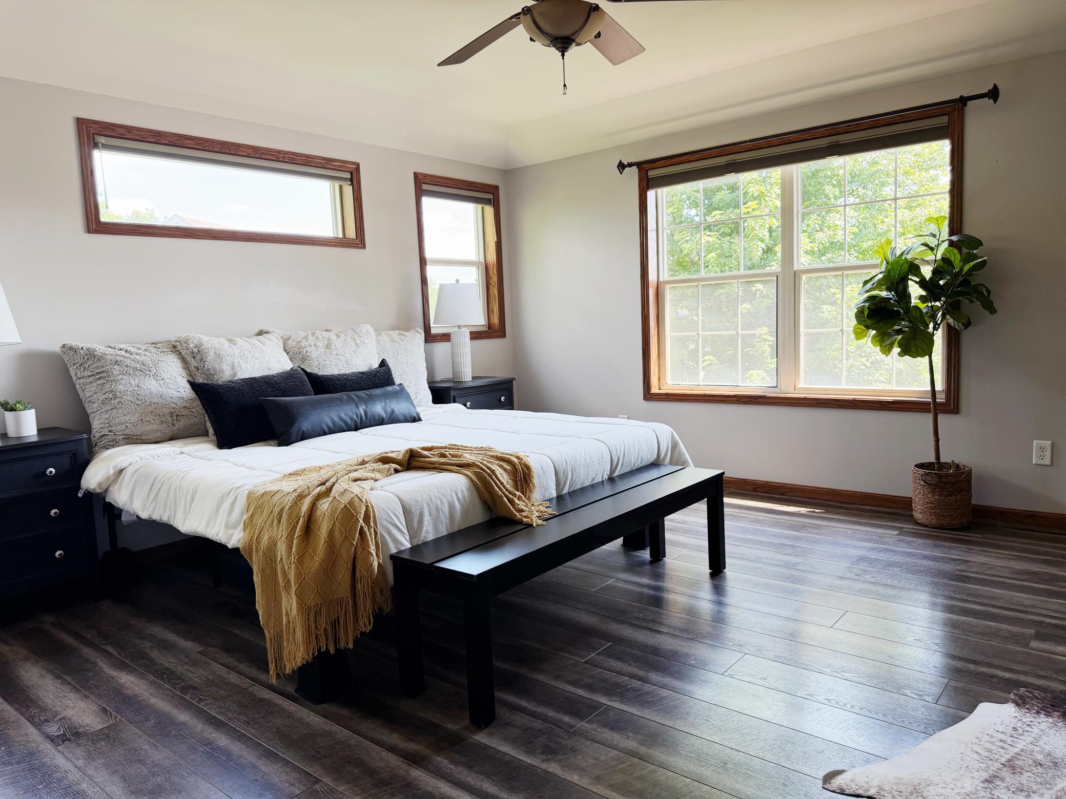 Spacious primary suite featuring dual closets for ample storage