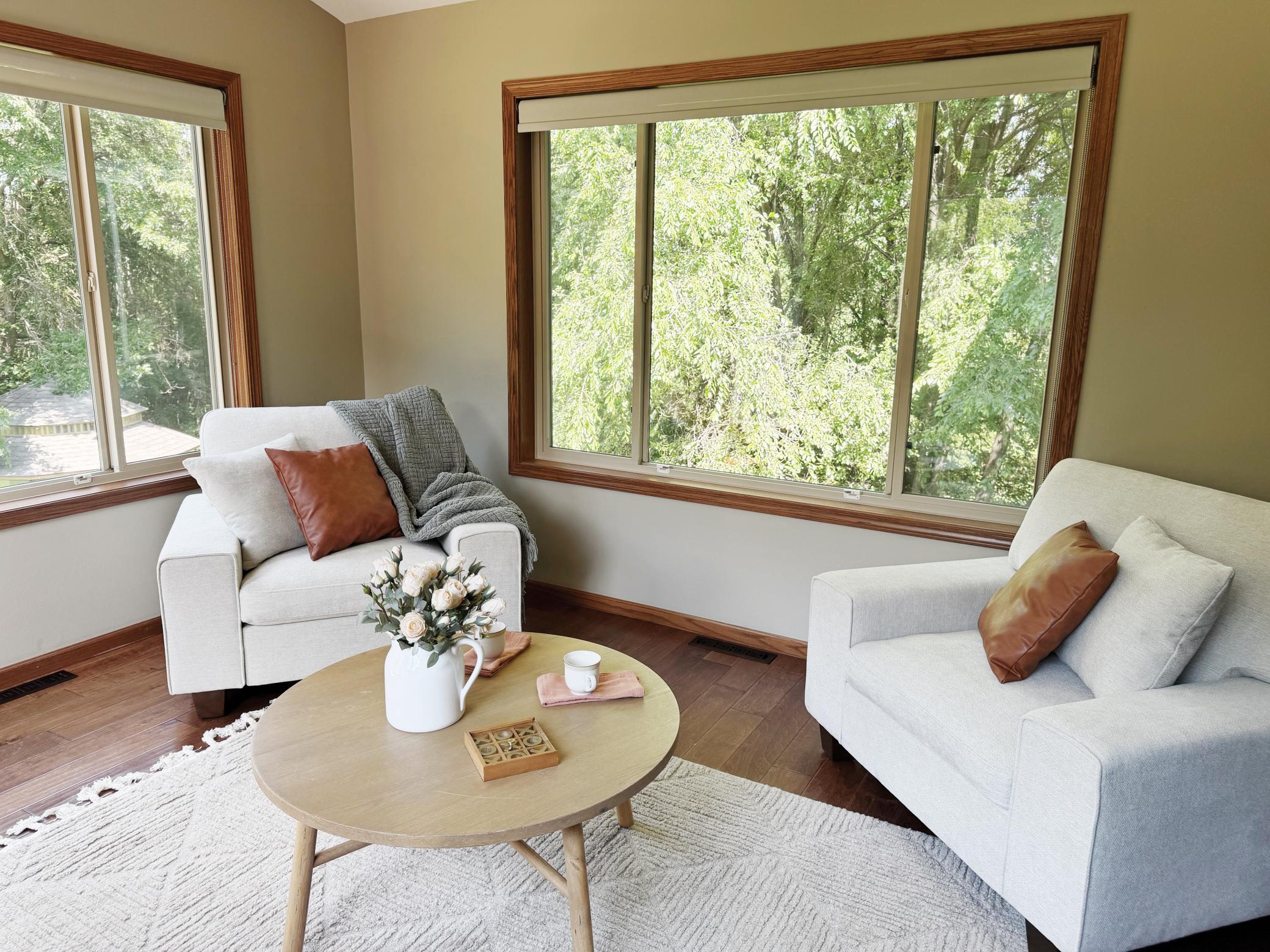 Bright four-season room filled with natural sunlight