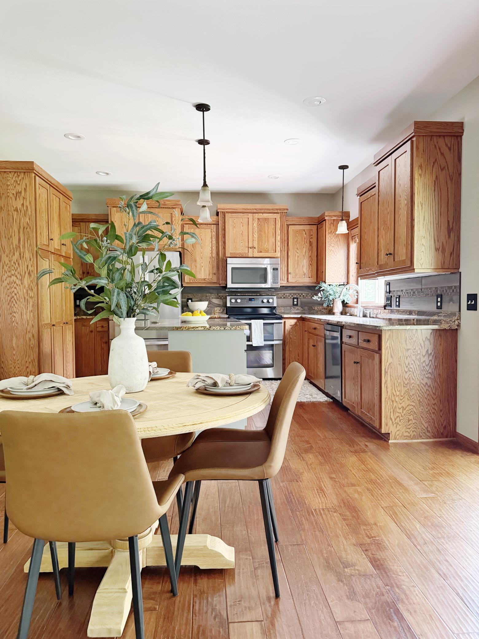 Kitchen is designed with functionality in mind, offering abundant cabinetry and storage