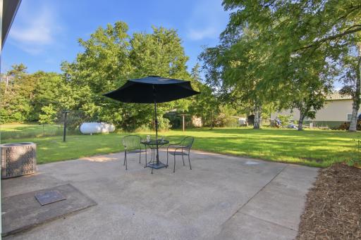 Patio & Partially Fenced Back Yard
