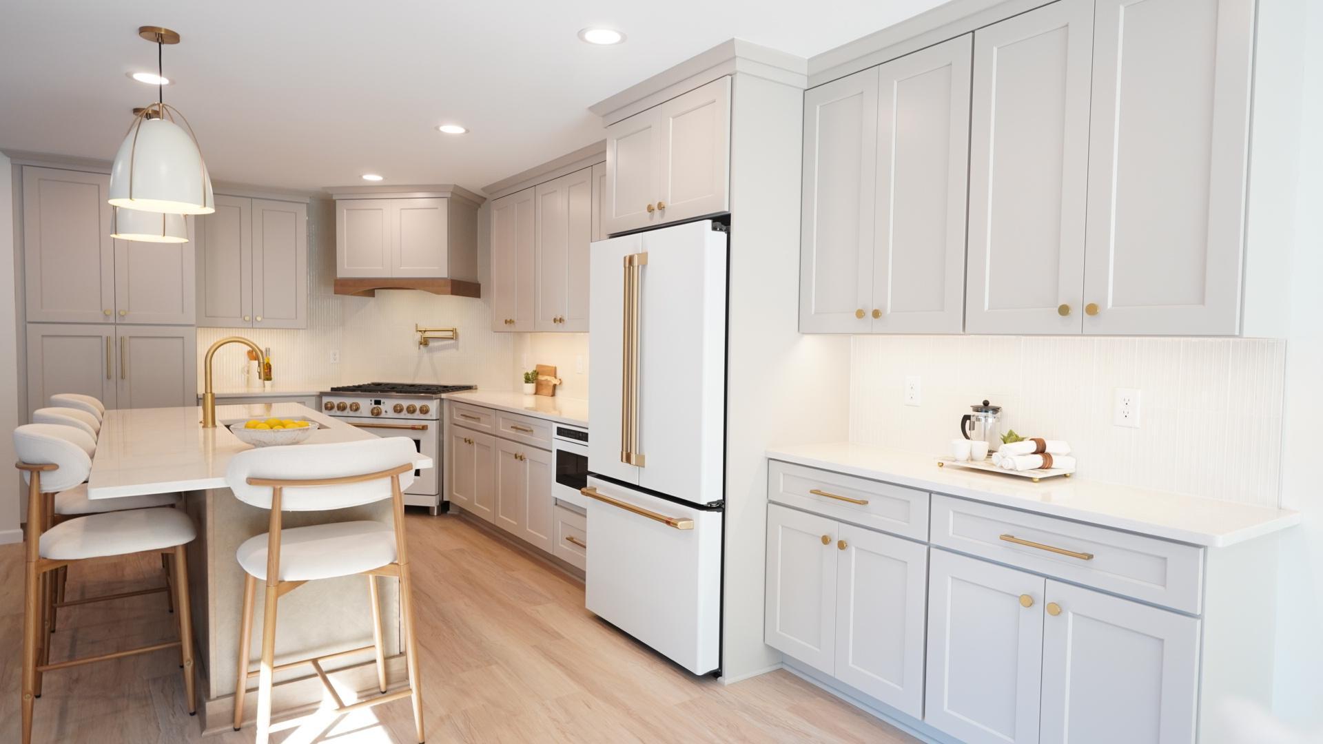 The open, highly customized kitchen includes a separate coffee bar, ample storage, under cabinet and pendant lighting, beautiful backsplash tile and a large island that can comfortably seat four.