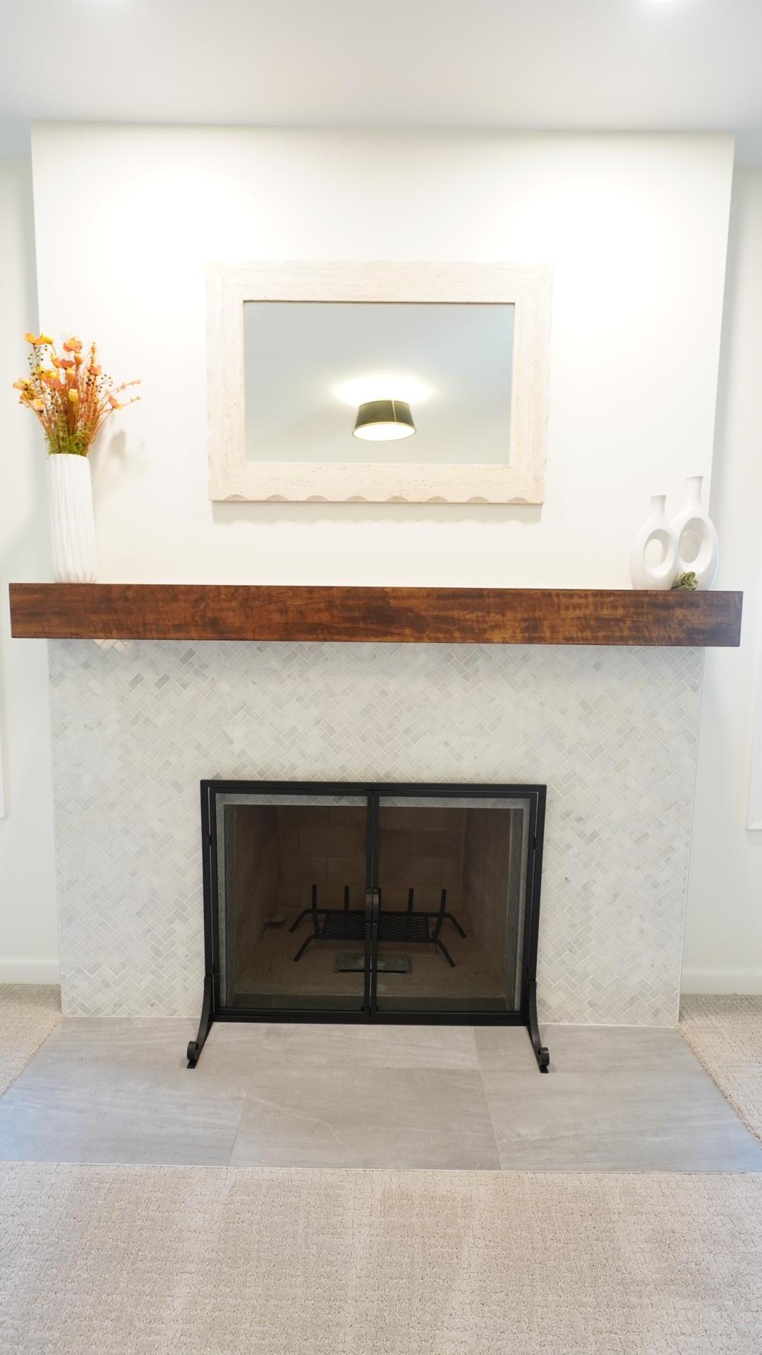 The wood-burning fireplace in Bedroom 2 has a gorgeous new tile surround, hearth and mantel, and includes a natural gas stub in the firebox for easy conversion to gas.