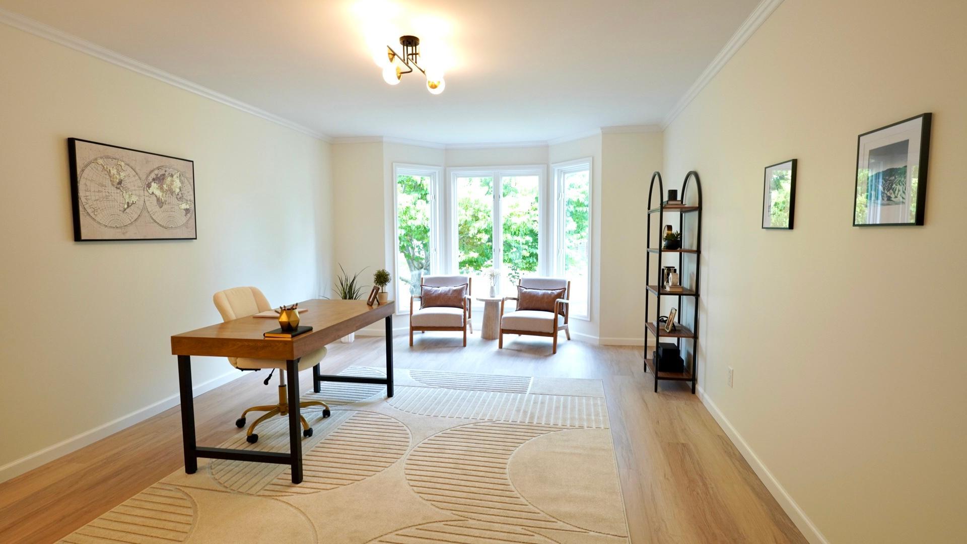 The office is located right off the front foyer and is an extremely large, bright and versatile space with a bay window at the end.