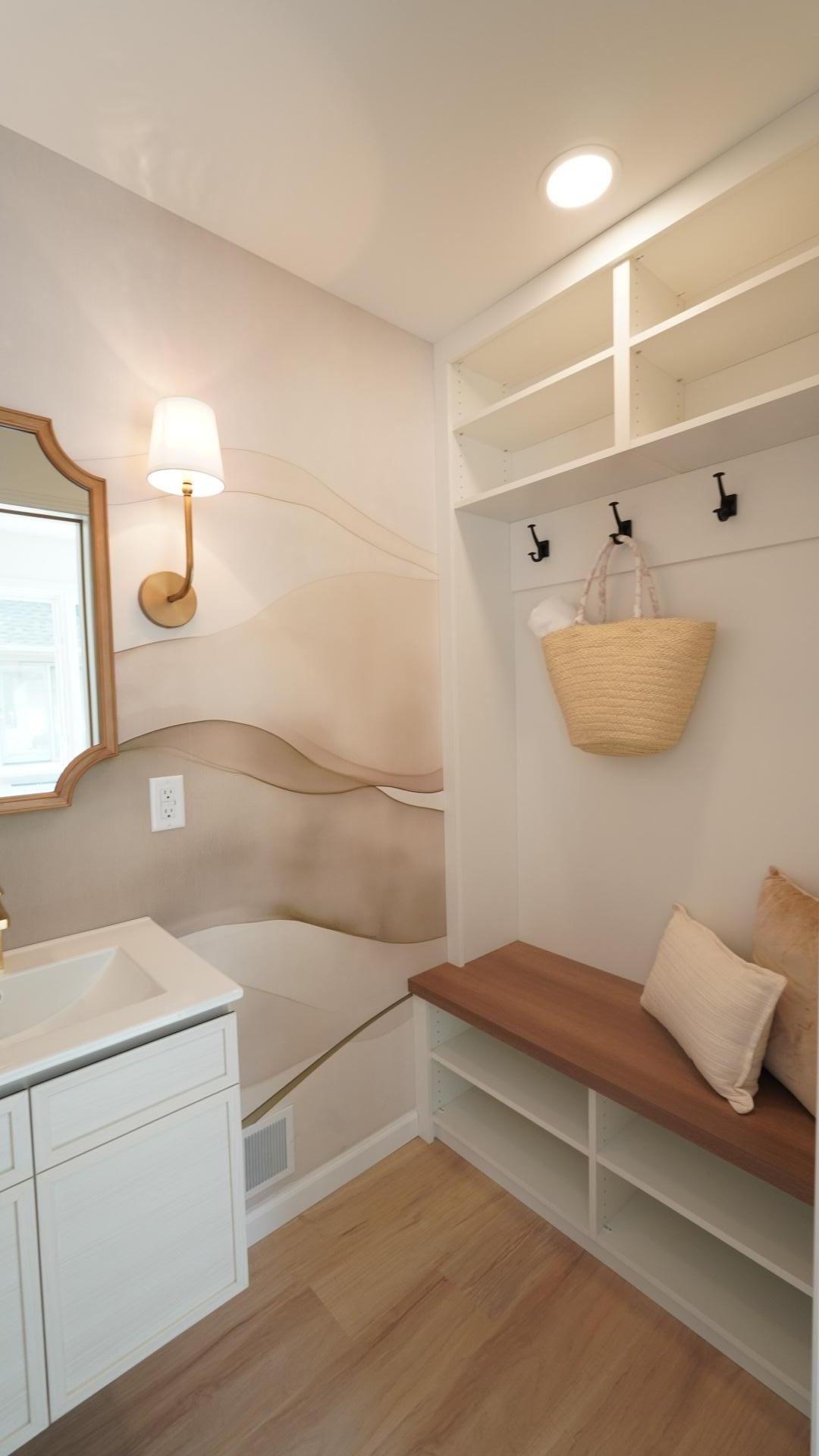 Bathroom 3 doubles as a pool changing area with a fully custom closet system that is perfect for towels and guest storage.