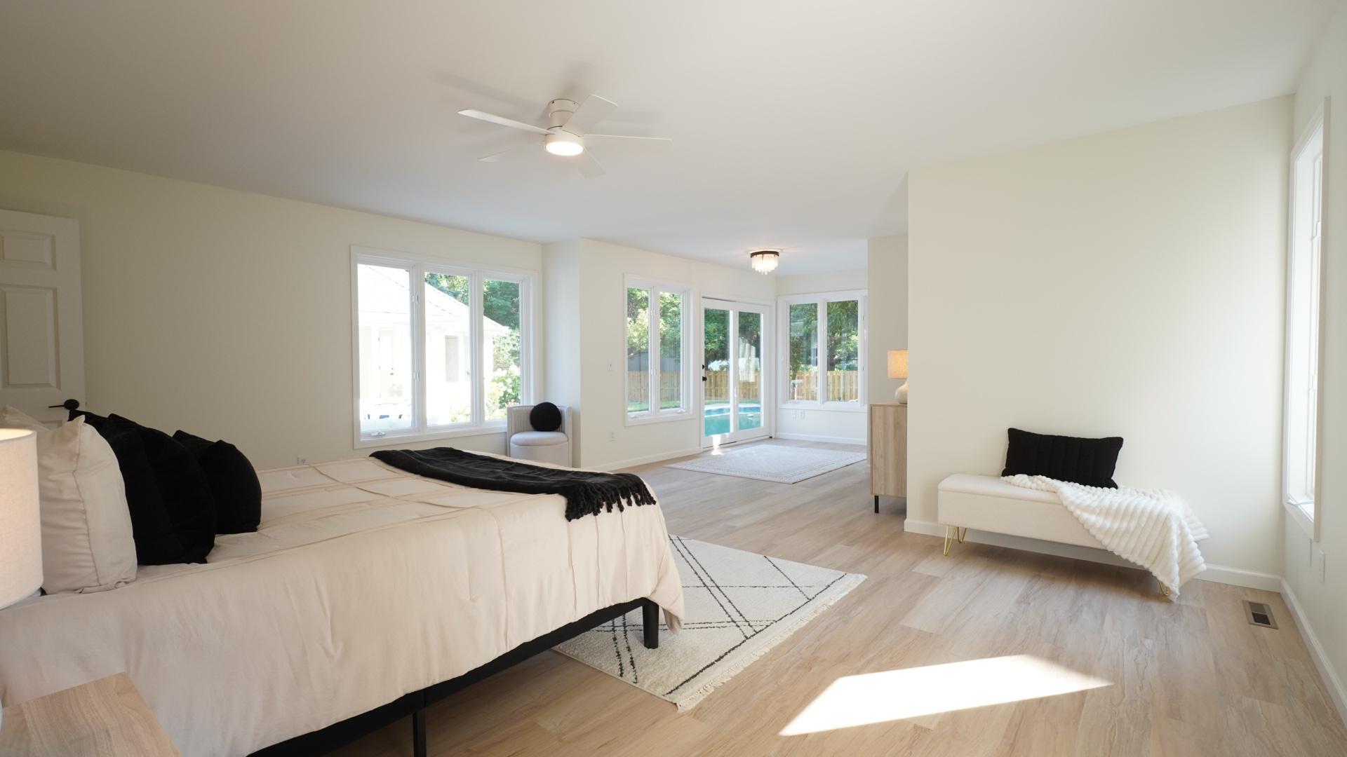 The large owners suite possesses brand new flooring, lighting, paint, and its own access to the pool.