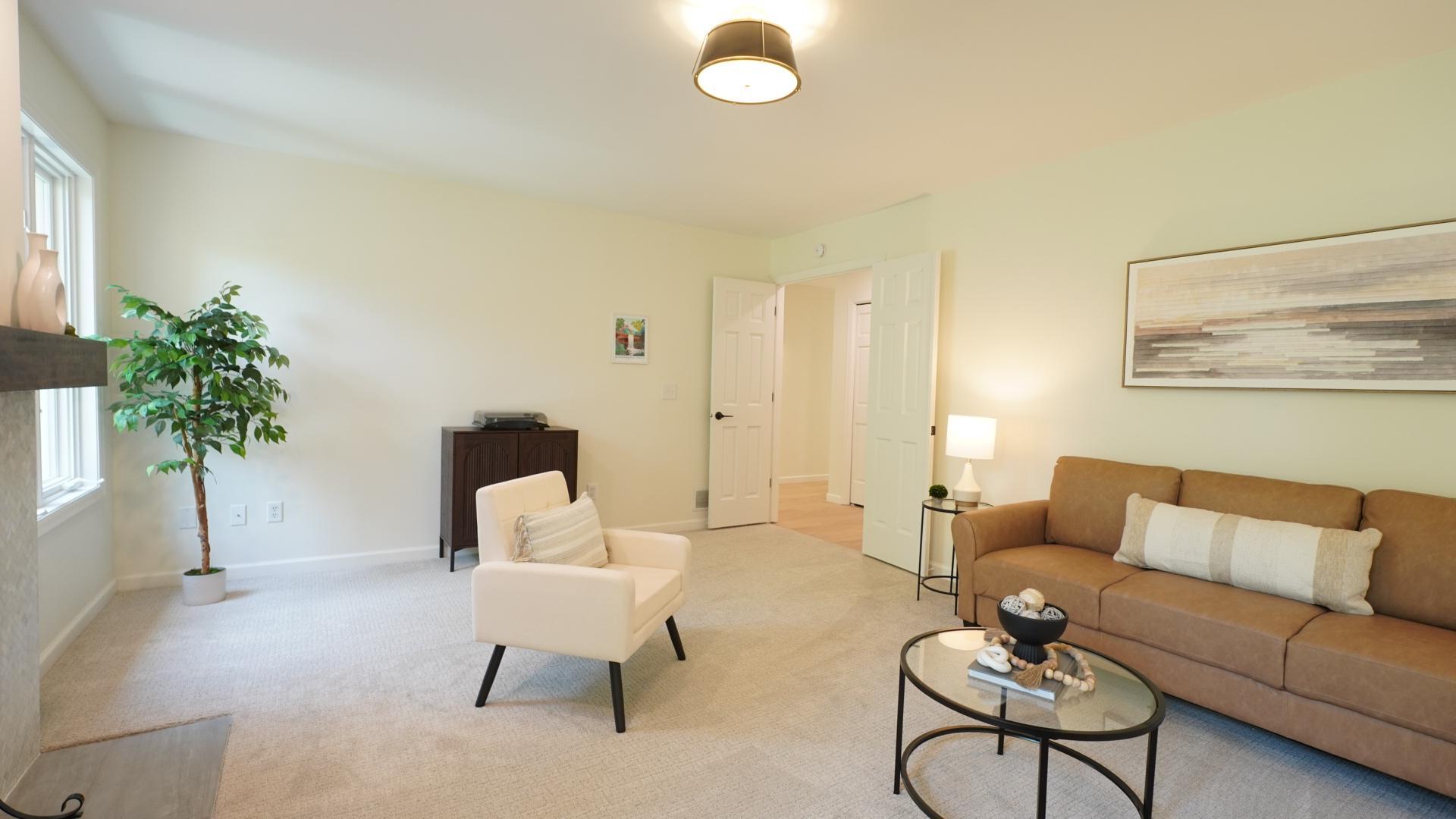 The second bedroom with an extra-wide, double door entry is currently staged as a den but can easily meet other needs such as a billiard room, library, or a fabulous guest room.