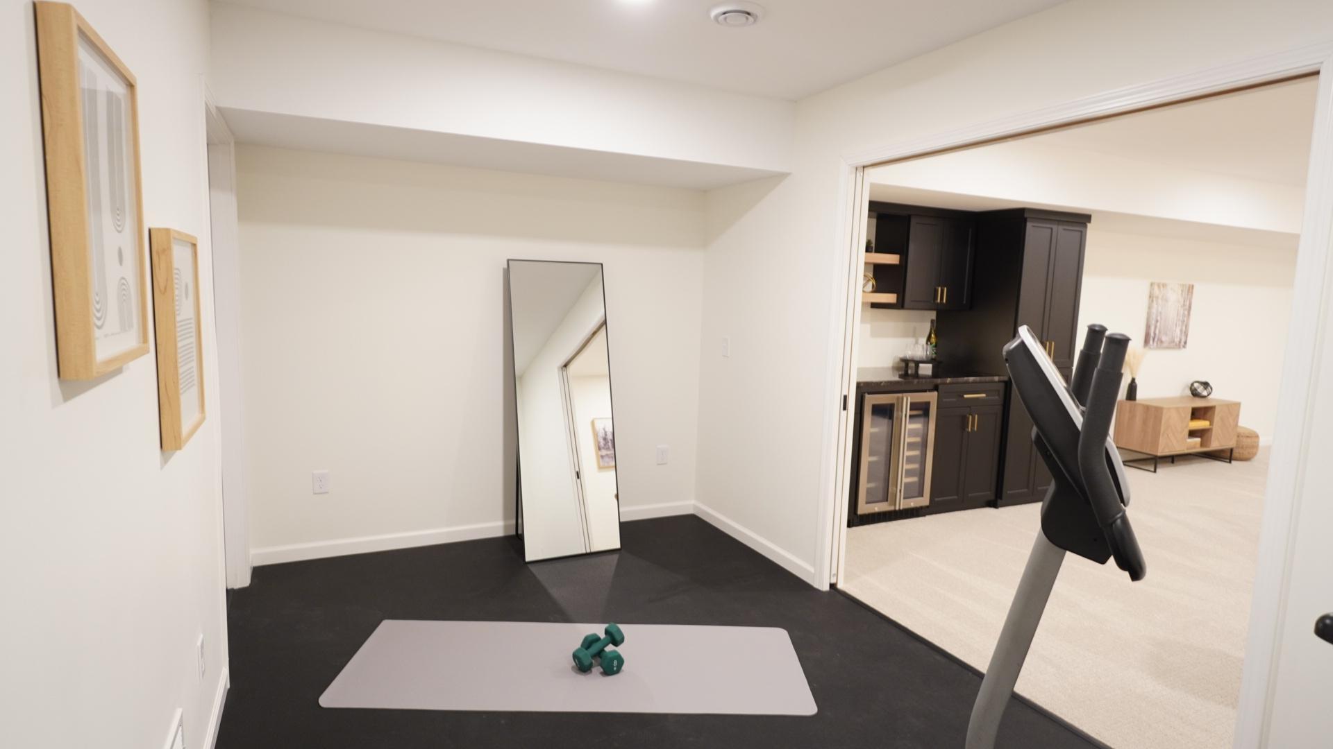 The newly added workout room includes two closets and brand new double pocket doors for privacy.