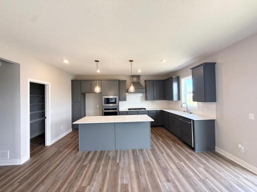 Picture of the actual home, just as pictured, come home to your beautiful gourmet kitchen
