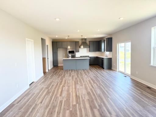 Photo from Actual Home: Large gourmet kitchen that leads you directly into your dining and family room space.