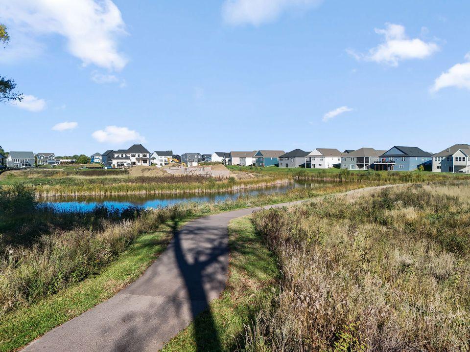 Large pond and grassy areas
