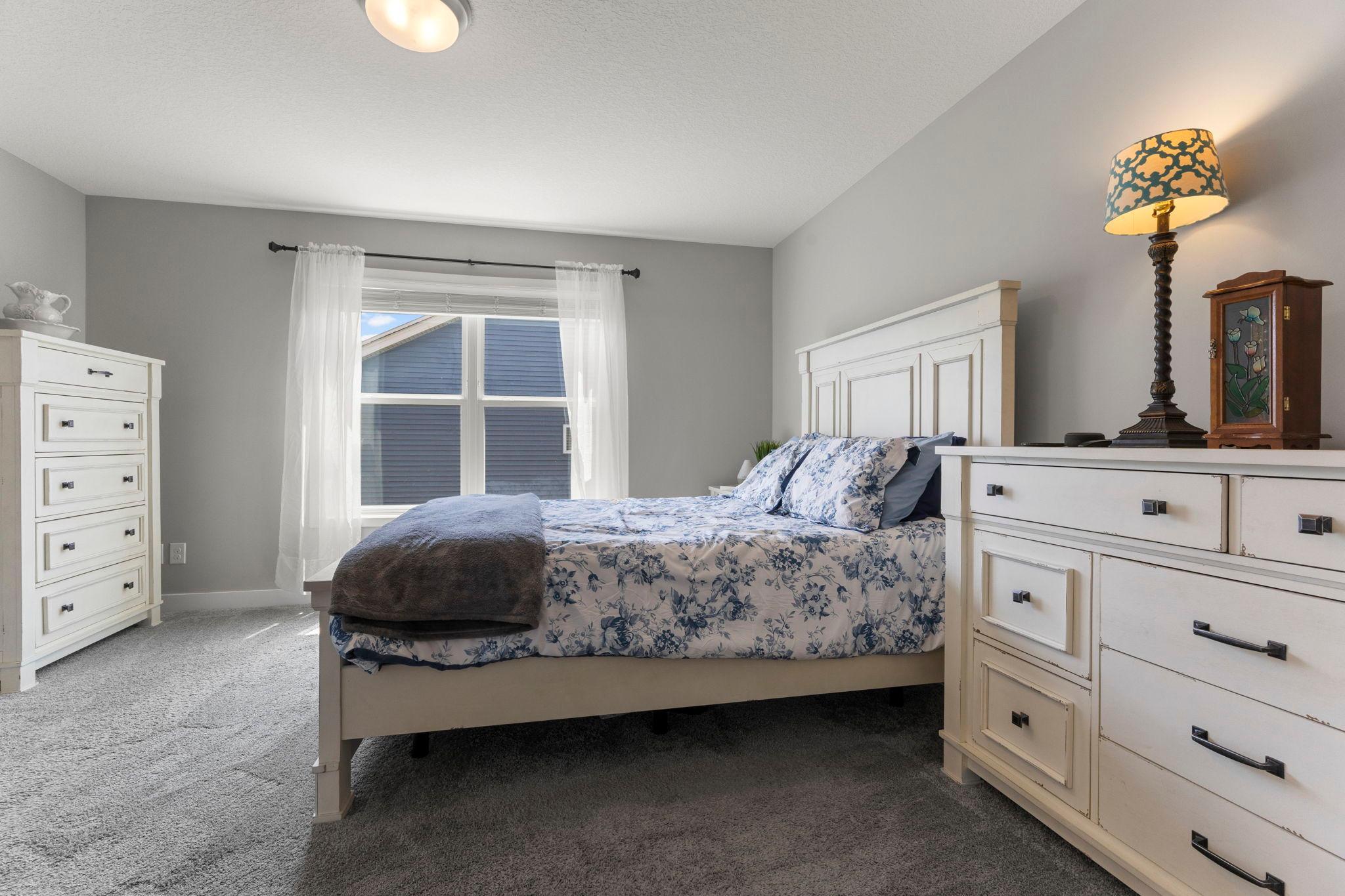 Primary bedroom also has walk-in closet