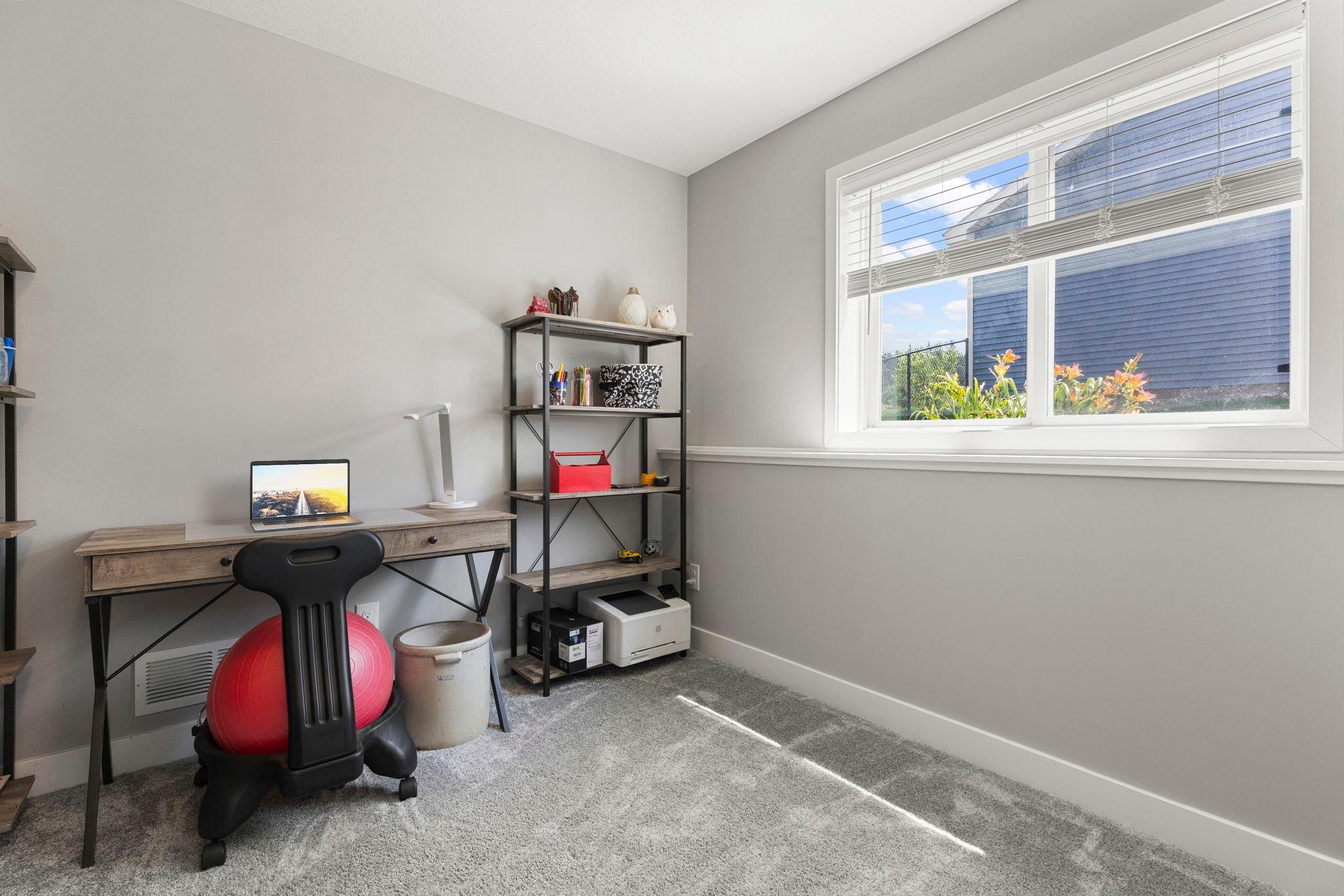Lower-level bedroom, office or work-out room