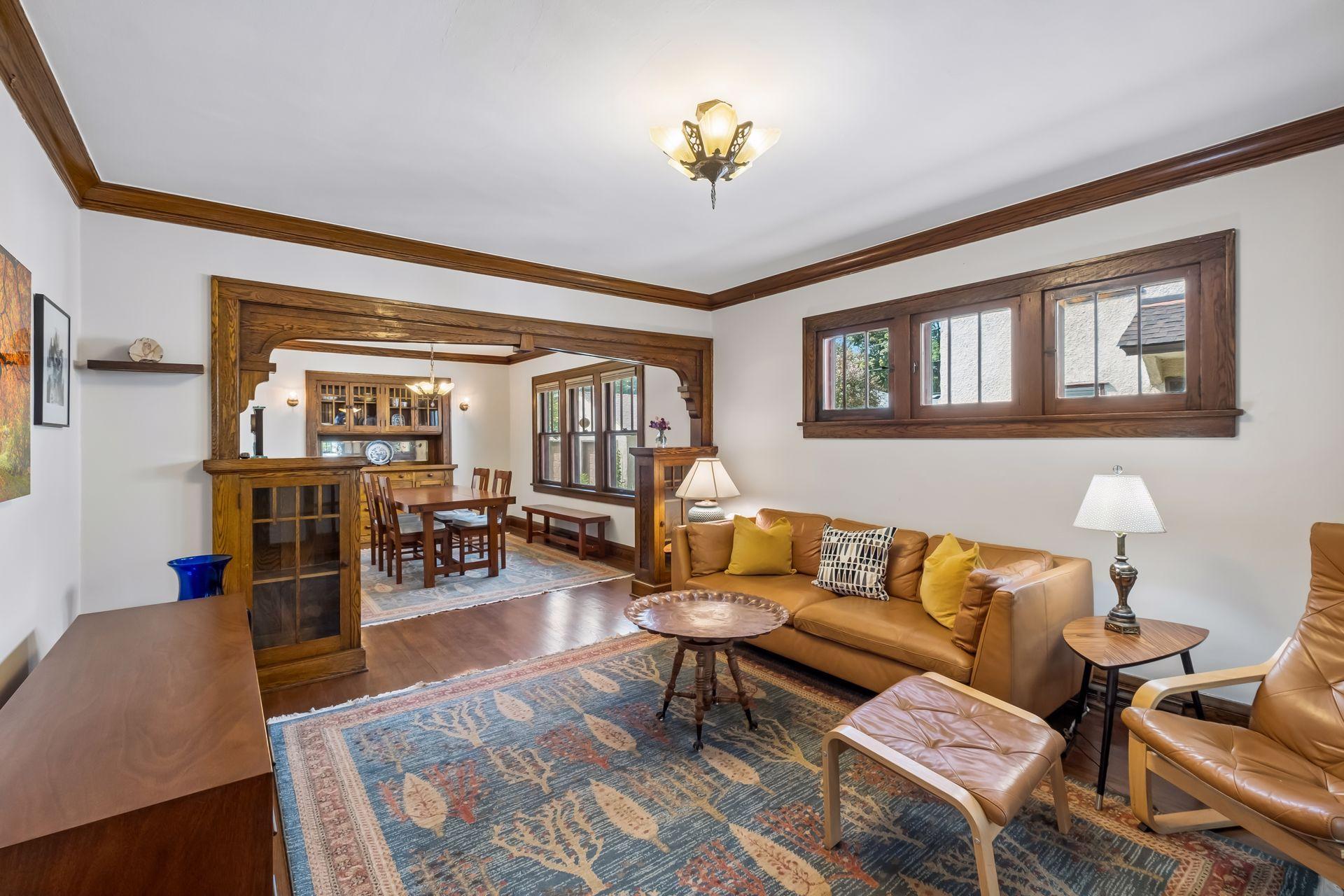 Original piano windows and built-in bookcases.