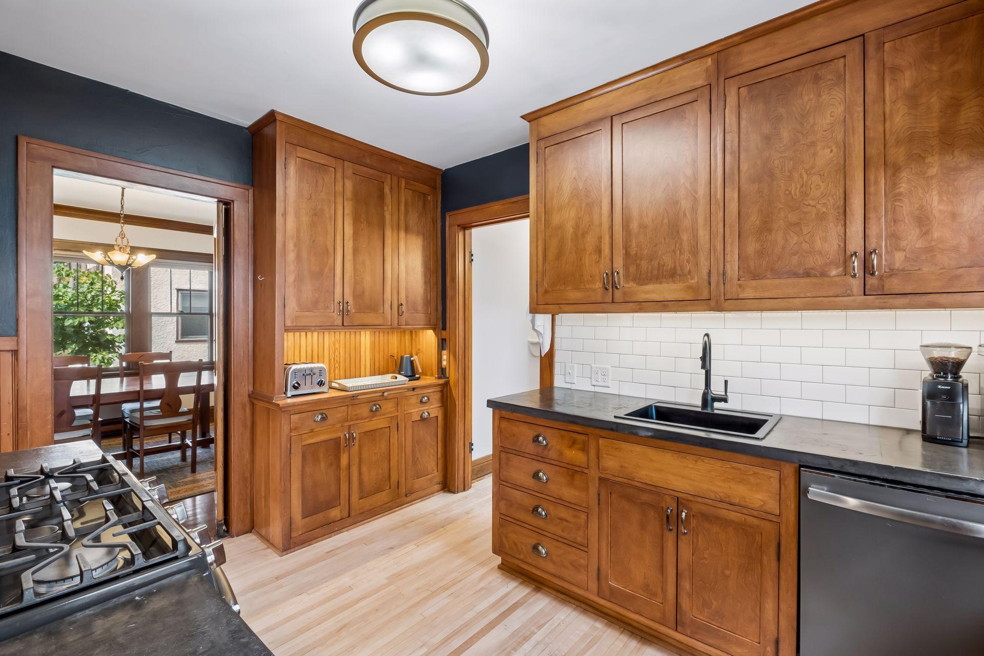The kitchen, hallway, main floor bedroom and rear mudroom have newly refinished hardwood floors.