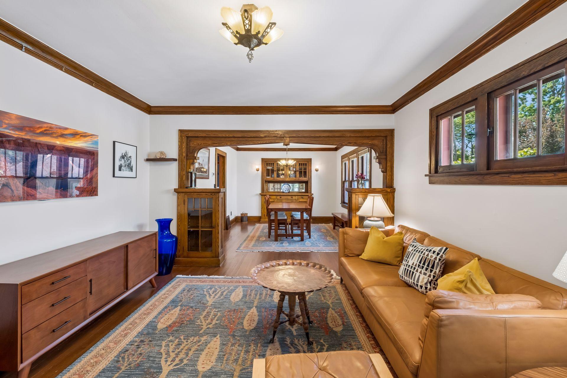 This Arts & Crafts Bungalow provides flawless original woodwork, vintage details, and elegant rooms.