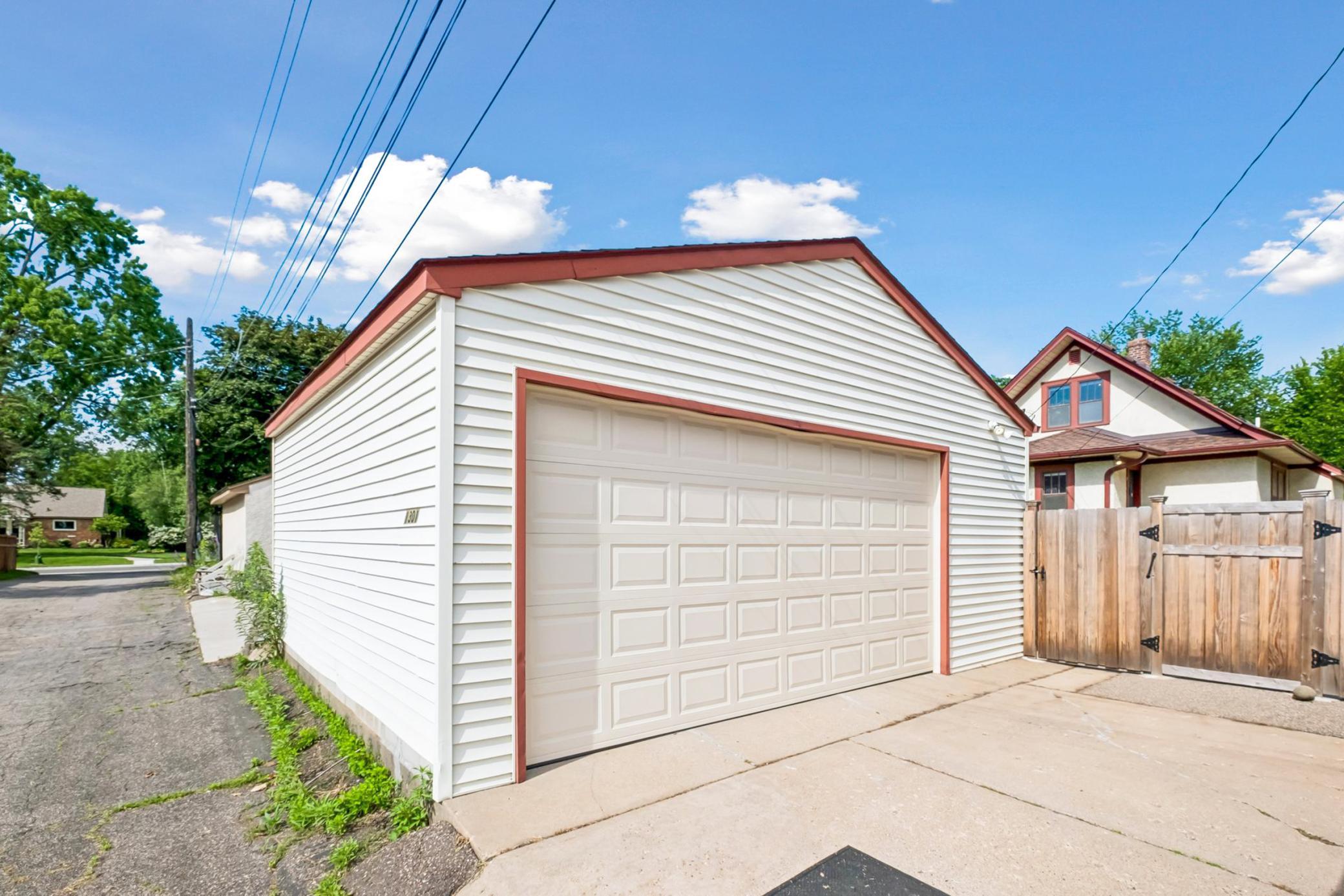Oversized 2 car garage was built in 1991. New mechanicals and springs replaced 2024.