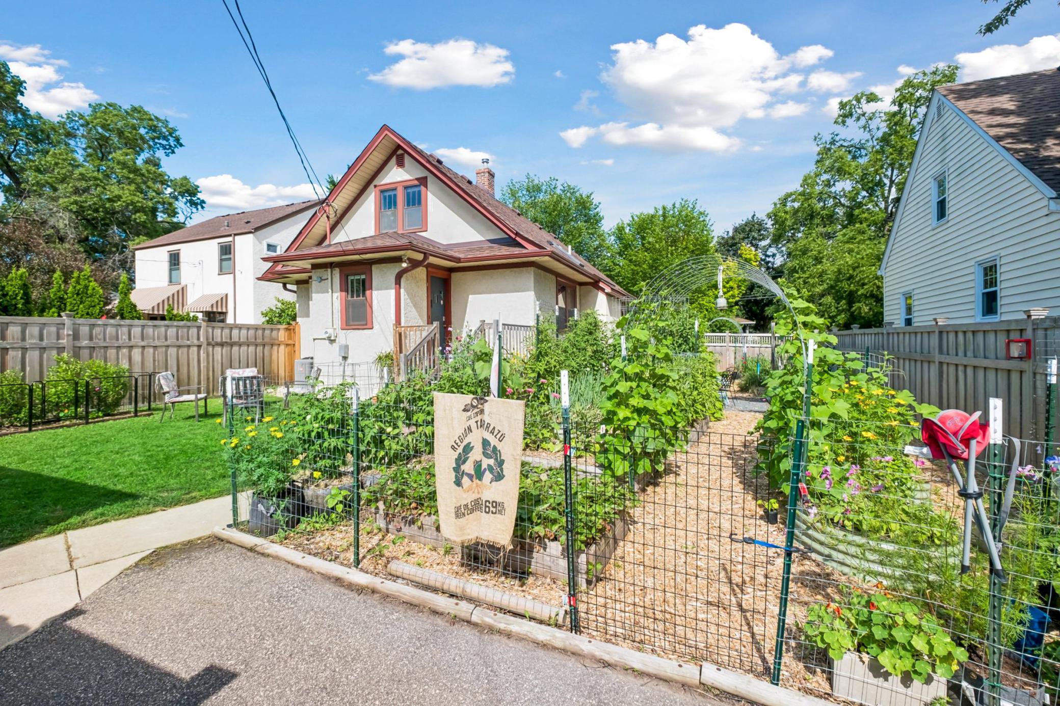 Multiple raised vegetable/flower beds will delight any gardener!