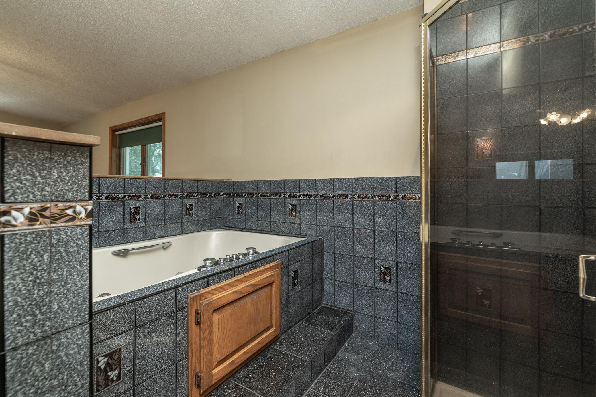 Primary Bath With Jetted Tub and Separate Shower