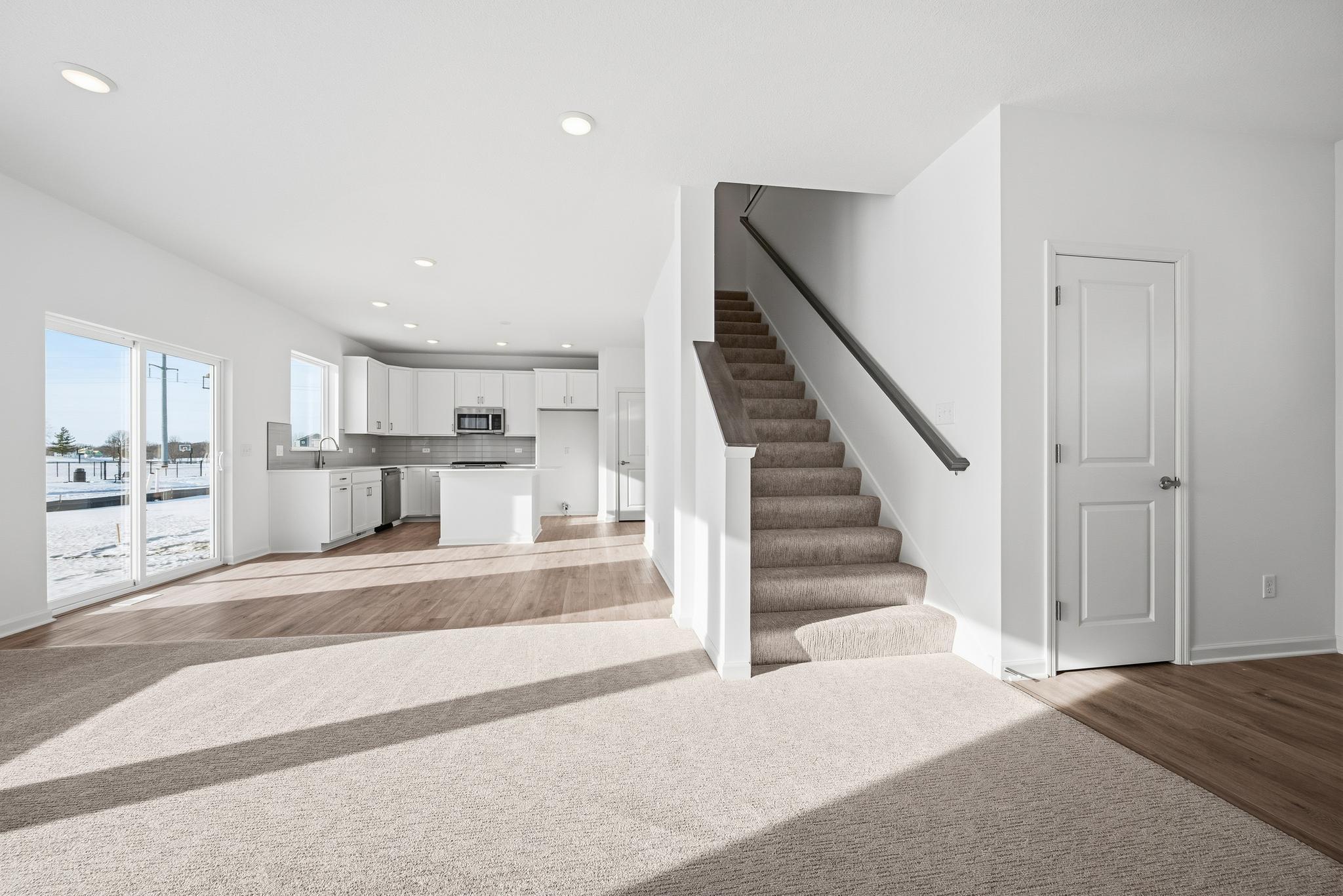 The open floor plan allows you to still converse with guests no matter where you are on the main floor of your home. Images of similar home, interior selections differ.