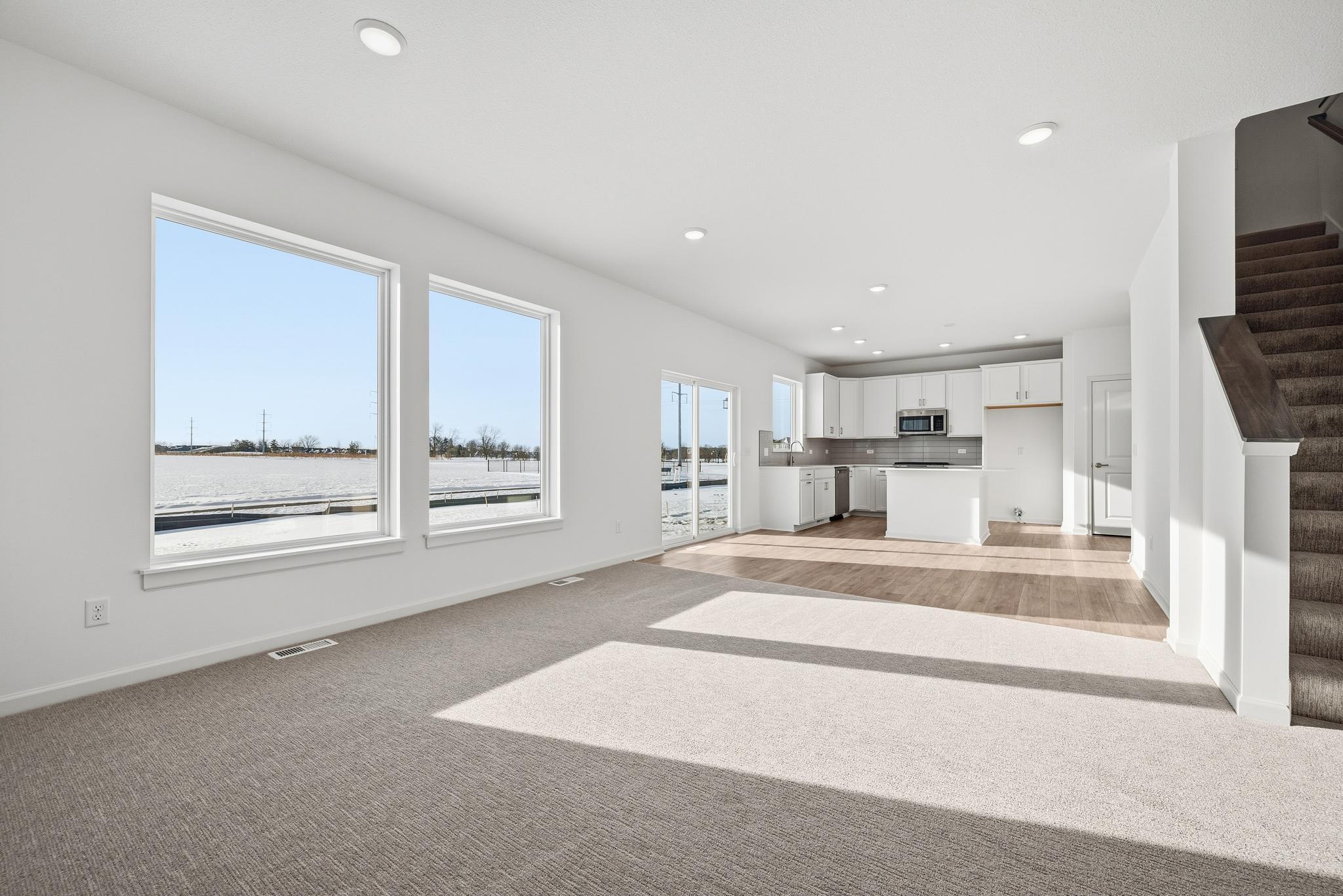 The open floor plan allows you to still converse with guests no matter where you are on the main floor of your home. Images of similar home, interior selections differ.