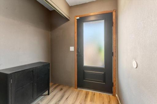 Front entrance. One of two newer doors.