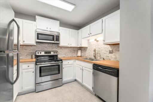 Updated Kitchen with beautiful backsplash